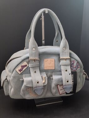 NWT,True Religion Light Wash Denim Satchel with Multi-patch Details.